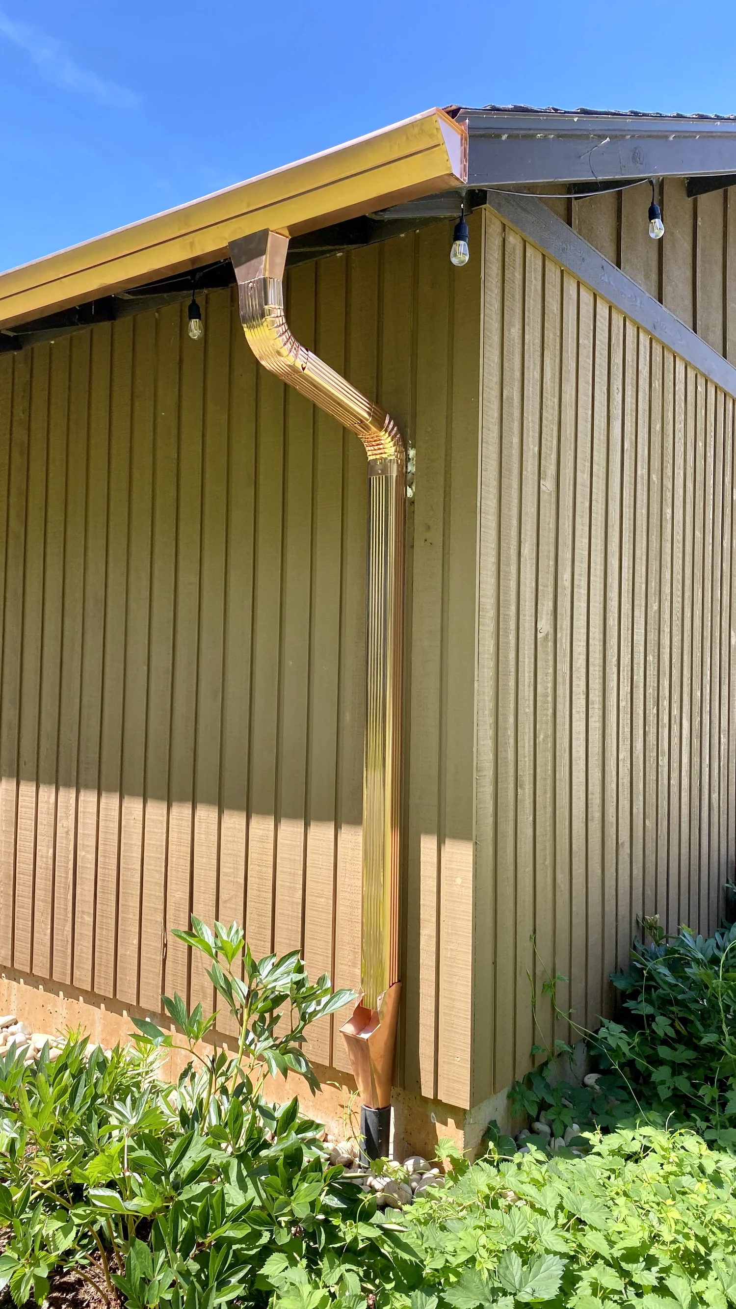 Bronze gutters and downspout on a detached garage at a Newberg-area home