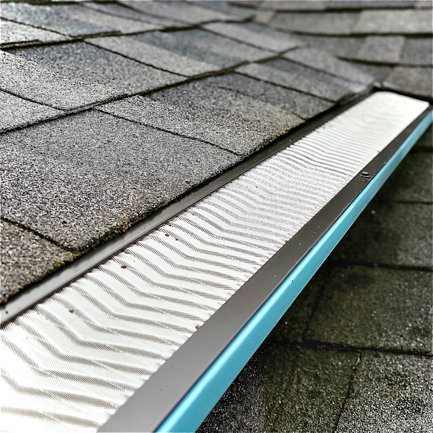 Custom downspout collector and metal channel drainage on a Tigard-area home